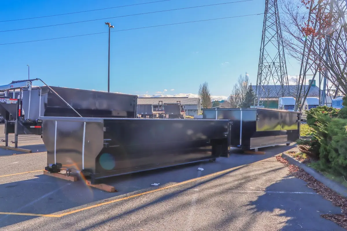 Roll-off dumpster ready for waste disposal at job site for 2 Yard Dumpster Rental in Chestnut Ridge